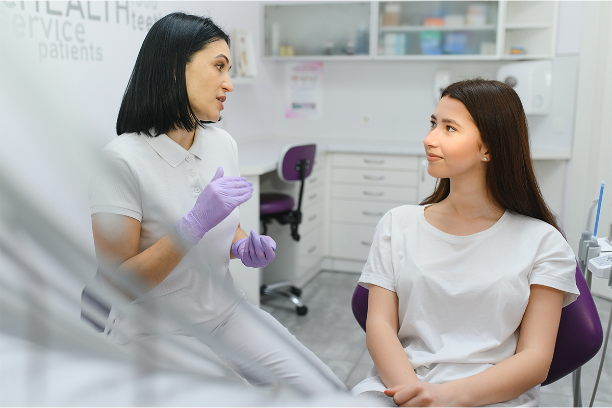 Dental professionals reviewing Ontario scope of practice changes for dental hygienists and denturists.